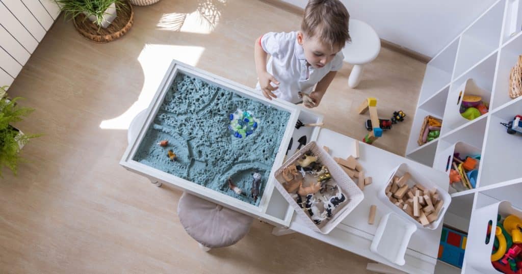 A boy playing in his sensory room 
https://www.autismparentingmagazine.com/creating-sensory-space-for-asd-kids/